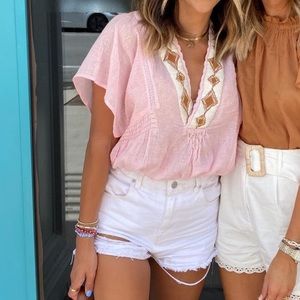 pink embroidered free people crop top
